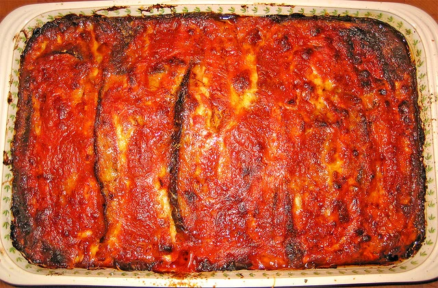 La parmigiana di melanzane: Un viaggio nella cucina siciliana
