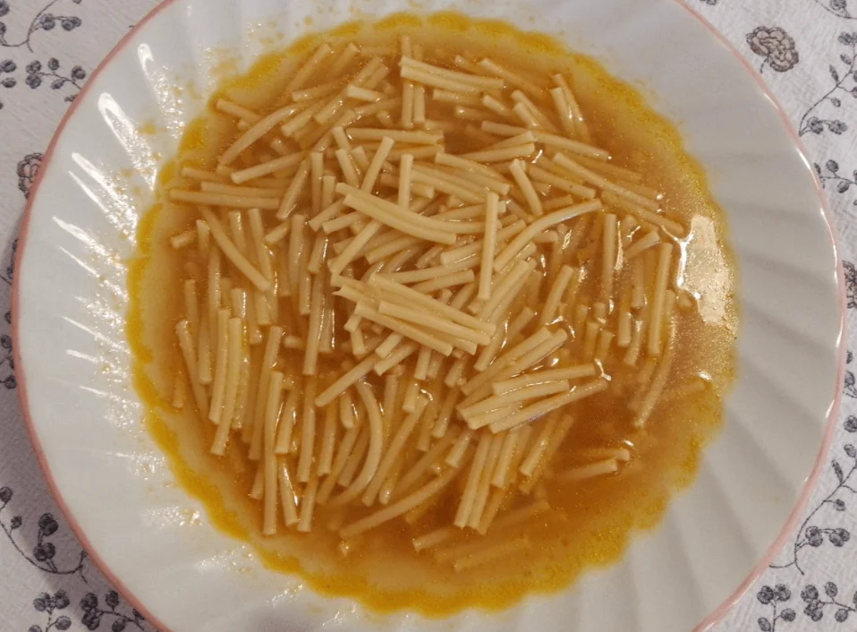 Spaghetti spezzati col brodo di dentice: Un tuffo nei sapori del mare